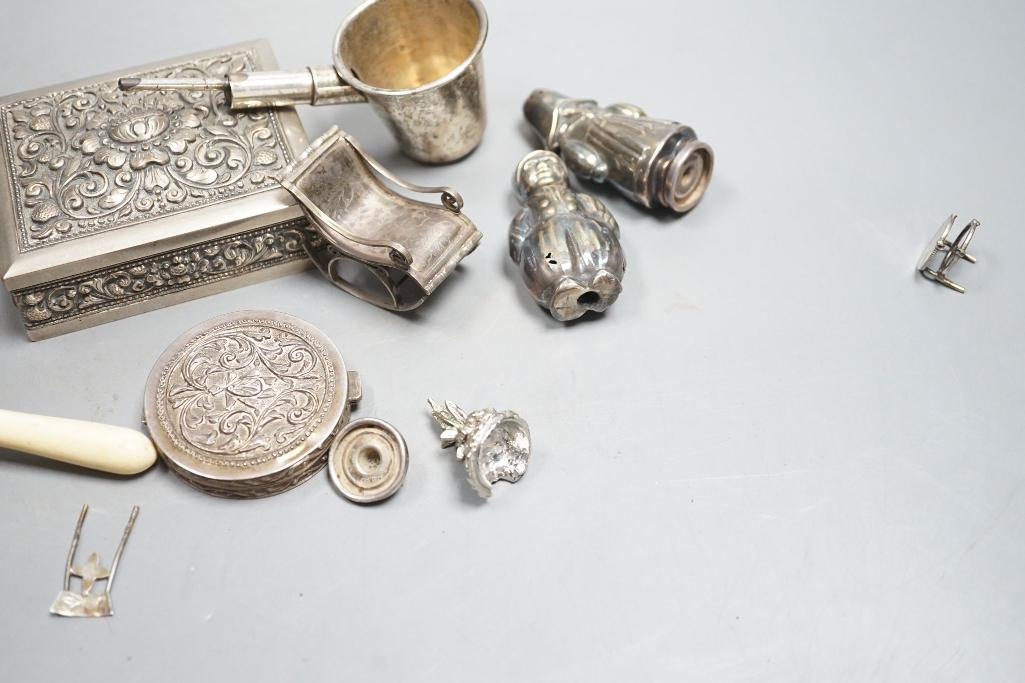 A group of small continental white metal items including a 800 compact, coin mounted miniature furniture, cigarette box, plated lamp lighter, etc.